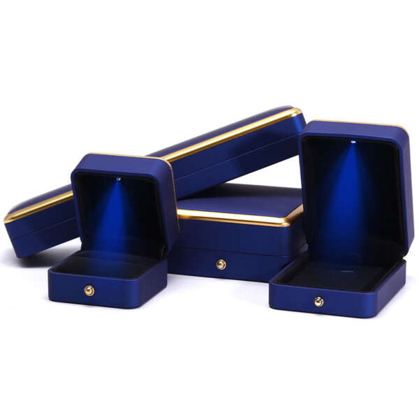 Open square LED jewelry packaging showing soft lining