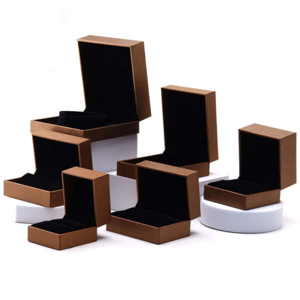 Open jewelry paper box showing soft fitted insert