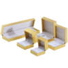 Gold paper jewelry gift box with leather look finish