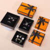 orange black cardboard jewelry set box for necklace earrings ring - front view