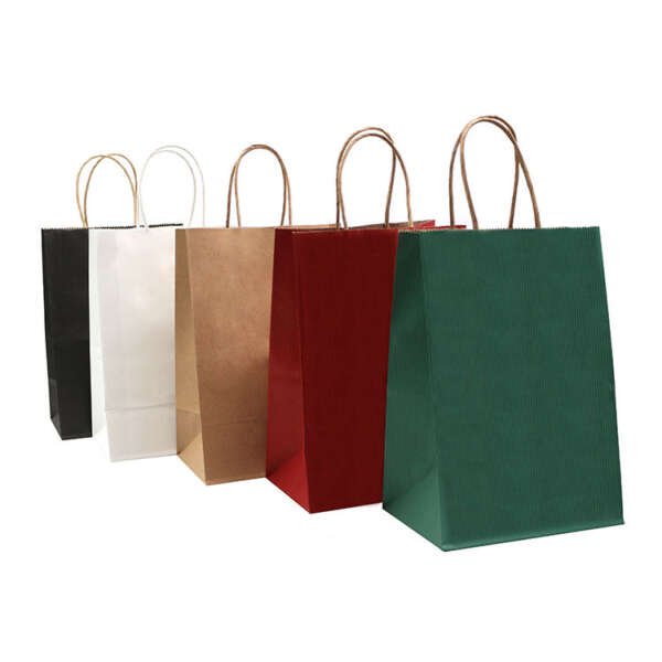 Custom colorful handle paper gift bag for gifts, events, boutiques, retail promotions and branded packaging