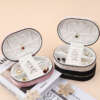 round zipper jewelry storage box for necklace ring earrings - front view
