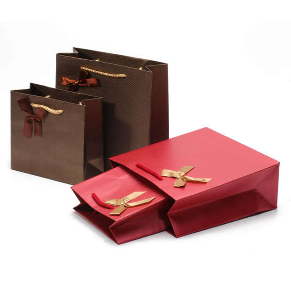luxury stamped jewelry gift paper bag with bow ribbon - detail view