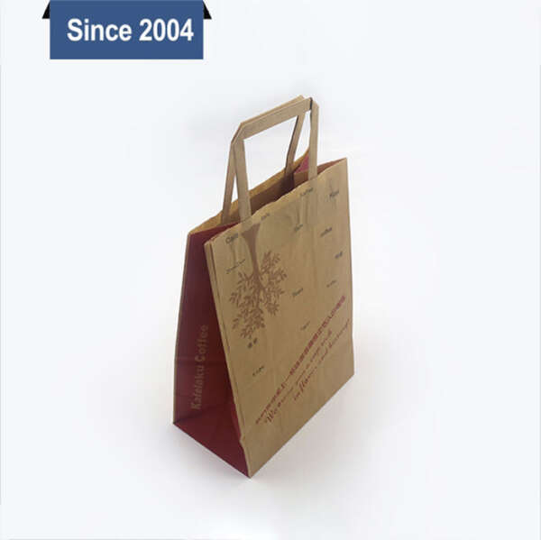 custom kraft gift paper bag sample with ribbon handles for boutique retail packaging