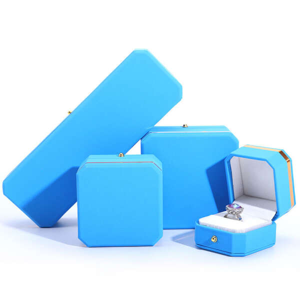 octagonal PU leather jewelry packaging box with metal button view 3