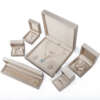 gold PU leather jewelry box with sponge insert for necklace ring - front view