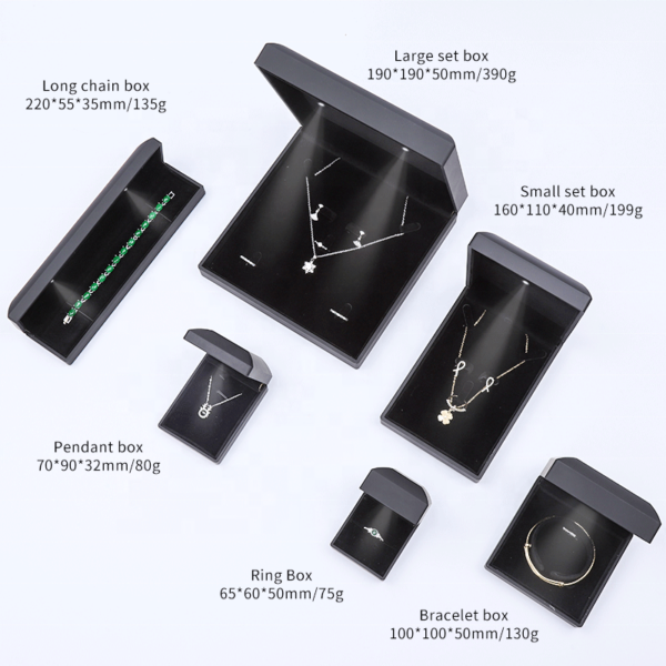 black plastic LED jewelry box with lighting for necklace bracelet earrings ring - open display view