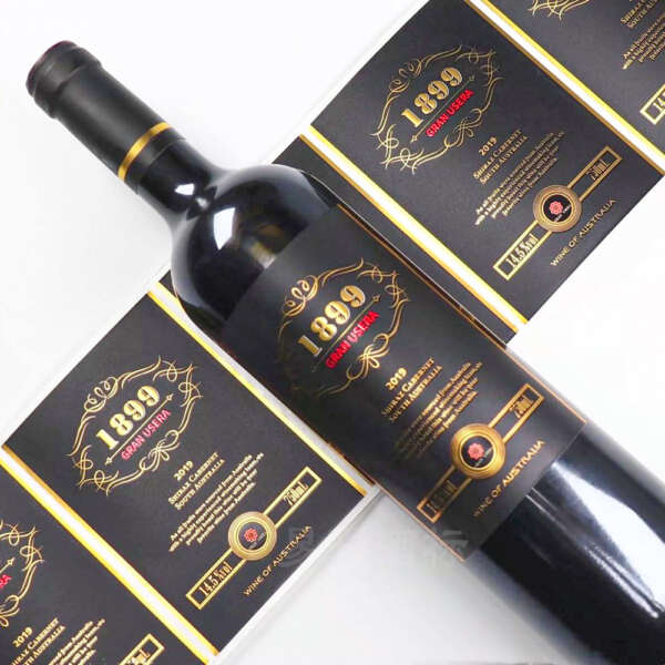 premium textured paper gold foil spot UV wine bottle label embossed detail view