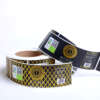 Industrial glossy packaging label with strong adhesive