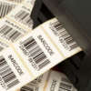 White scale label roll