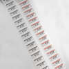 Garment hang tag price sticker with piggyback label layers