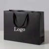 custom logo kraft coated paper shopping gift bag with handles view 1