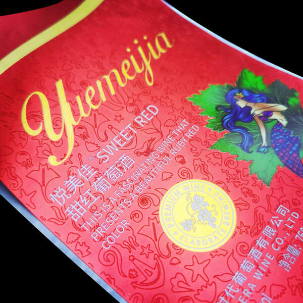 matte texture paper UV spot embossed red foil wine bottle label embossed detail view