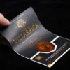 matt black textured paper gold foil embossed red wine label front view