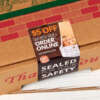 Tamper proof food container label with strong adhesive