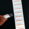 Peel-off three layer label for product tracking