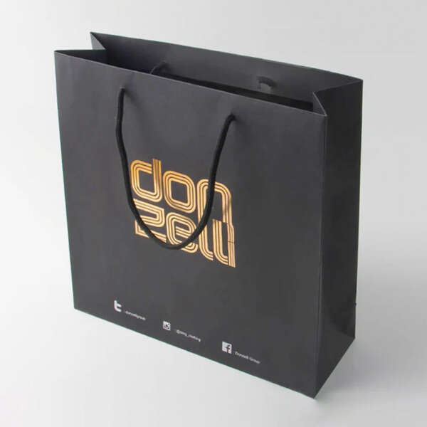 recycled big paper shopping bag with ribbon handles and logo view 5