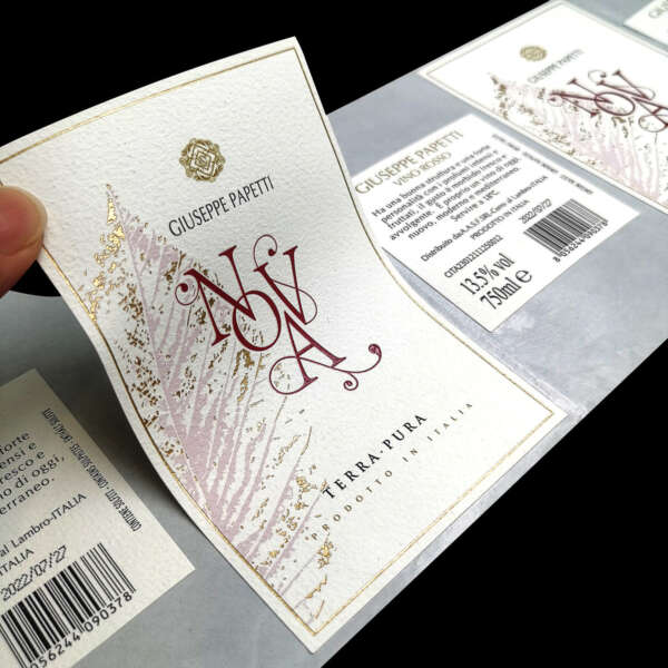 Luxury textured paper wine label with gold foil and blind embossing