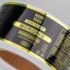 Adhesive logo roll labels for vitamin packaging
