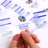 Custom clear cosmetic bottle labels with metallic logo printing