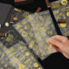 Transparent adhesive sticker sheet for packaging inserts