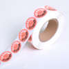 Product logo label roll with custom circle stickers