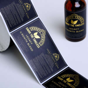 Embossed cosmetic bottle labels