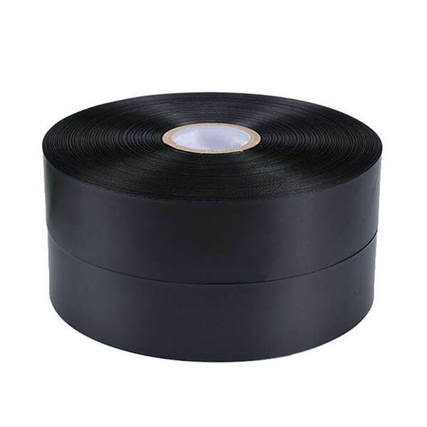black double sided polyester satin fabric clothing care label material detail view