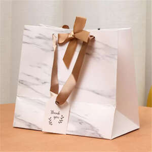 recycled big paper shopping bag with ribbon handles and logo view 1