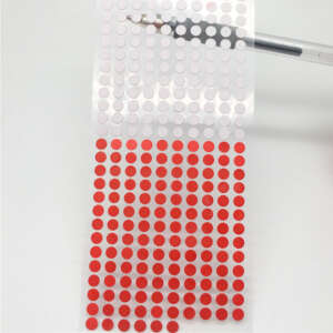 White sensitive paper label that turns red with water