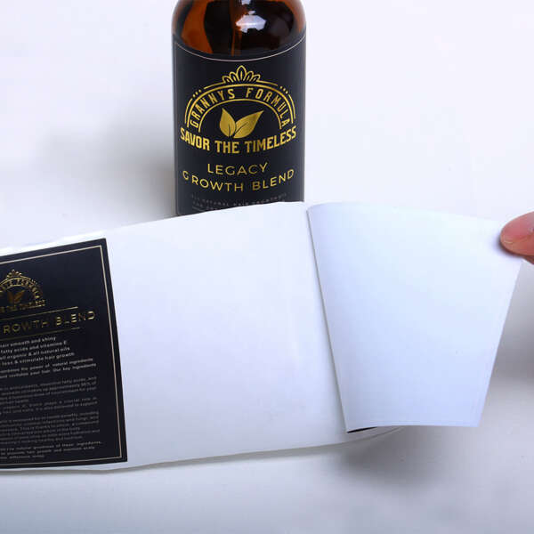 Printed bottle label sticker with foil stamped production detail