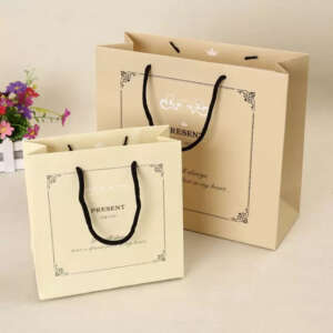 eco reusable boutique gift paper bag with embossed logo view 1