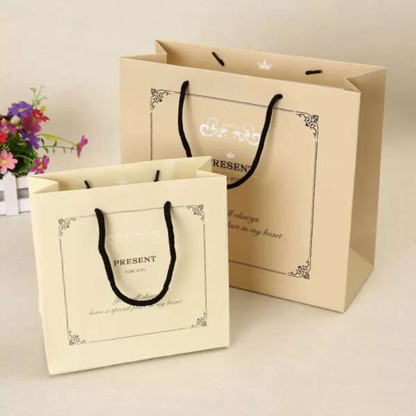 eco reusable boutique gift paper bag with embossed logo view 1
