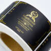 Embossed gold foil bottle labels