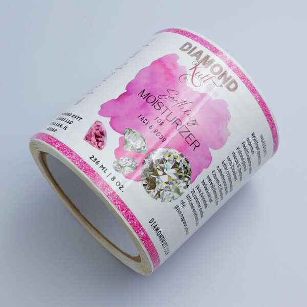 Adhesive packaging label rolls
