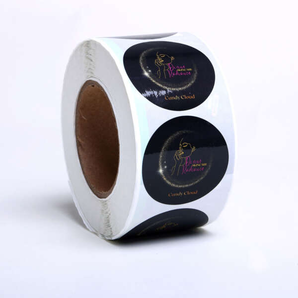 Self adhesive paper gift labels in round sticker roll format