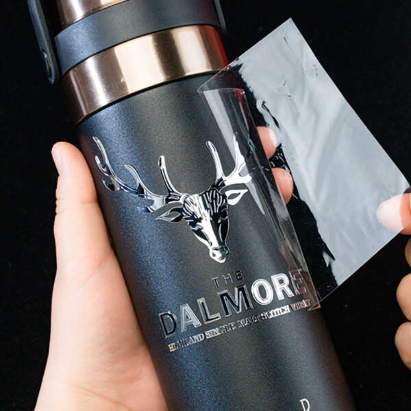 Thin electroform logo decal for premium packaging
