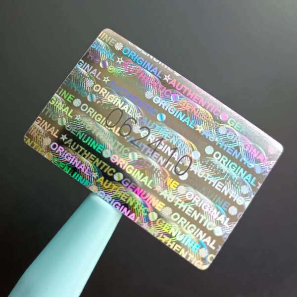 Holographic sticker for warranty and brand protection