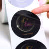 Glossy roll packaging stickers with custom round logo design