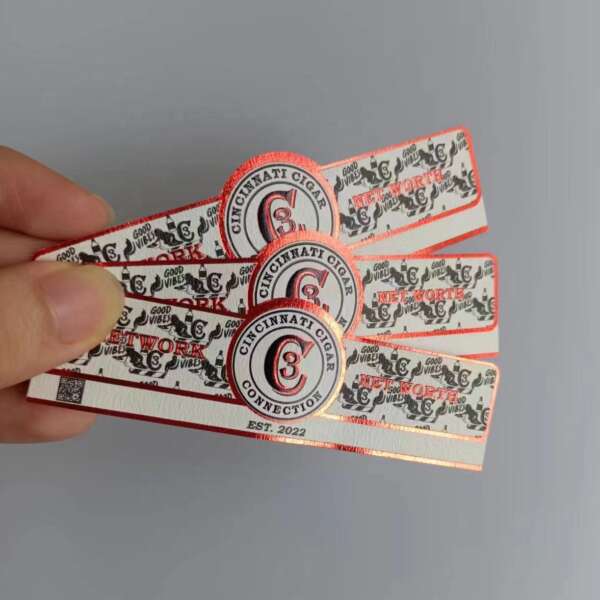 textured paper red black gold foil embossed cigar ring label front view