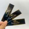 simple black gold foil stamping cigar ring label embossed detail view